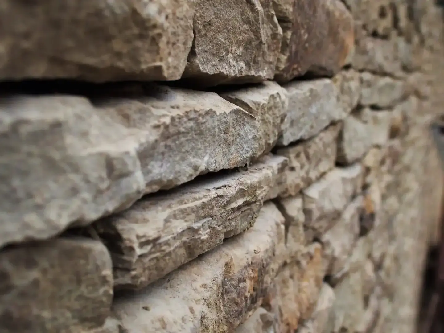 Close detail of hand-built stone wall at The Farm